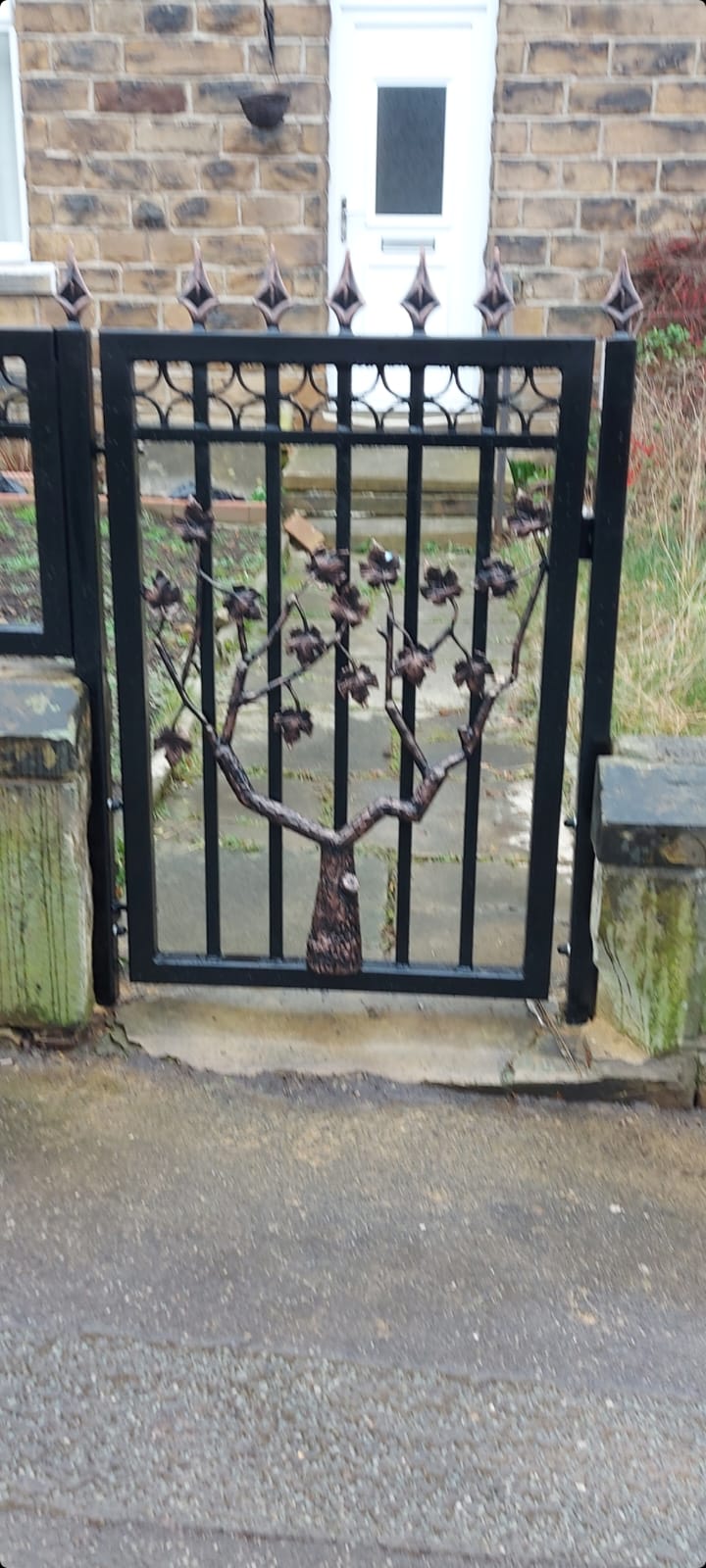 custom steel gate with tree design